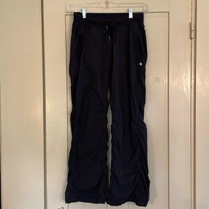 Lululemon black warm up pants size 8